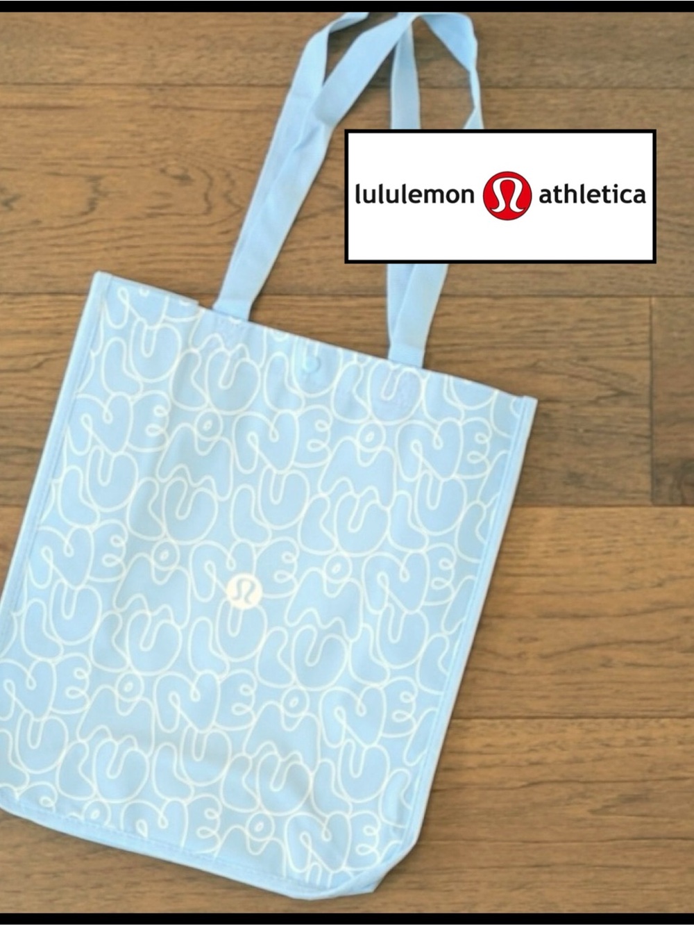 lululemon large reusable tote bag in baby blue bubble letters